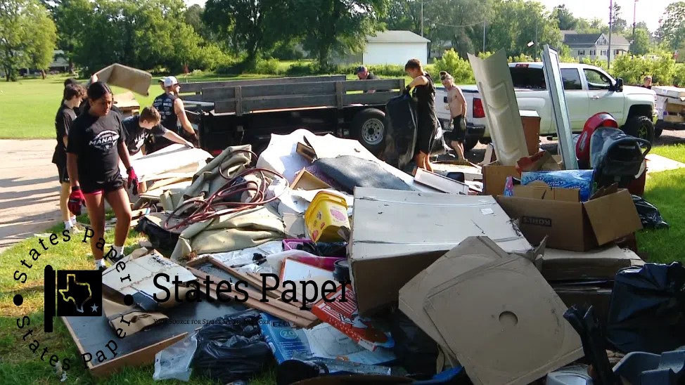 High School Football Team Helps Manawa Flood Cleanup